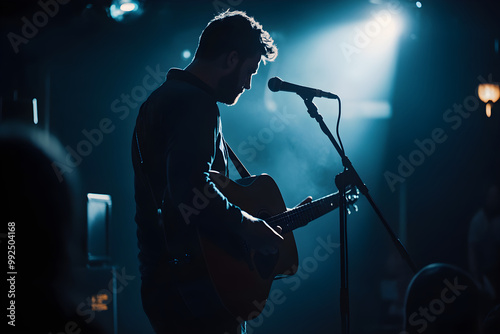 A Soulful Moment on Stage: A Musician's Heartfelt Acoustic Performance in an Enchanting Atmosphere