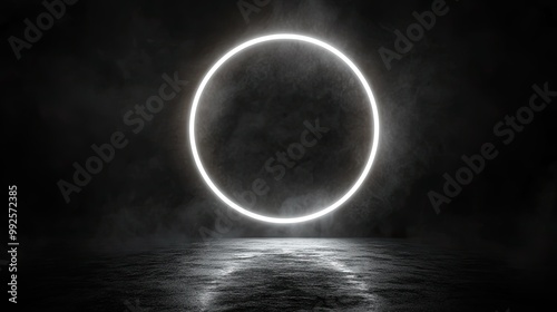 Luminous circle light frame on a dark background, emitting a soft white glow, ideal for highlighting text or objects in a dramatic, isolated space