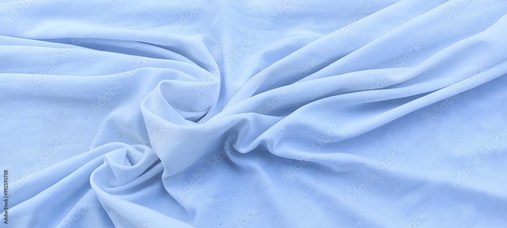 Fototapeta premium Waves form abstract textures and patterns on unique bright white cotton fabric