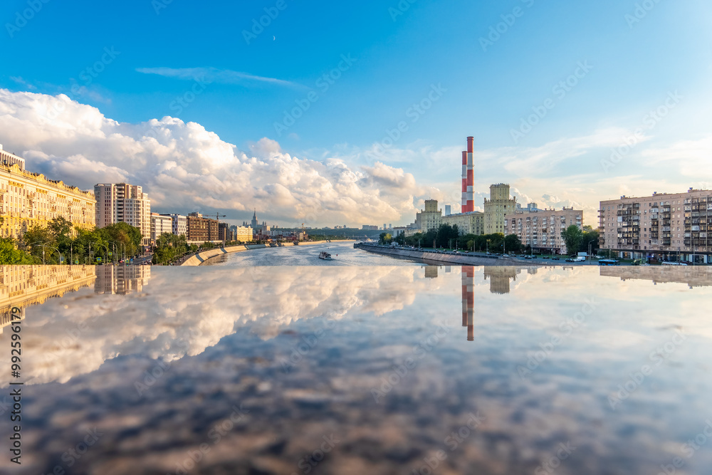 Fototapeta premium View of Berezhkovskaya Embankment in Moscow with reflection on a mirror stone surface