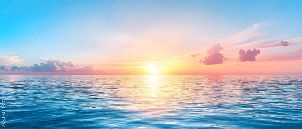 A tranquil ocean scene at sunset, featuring vibrant colors reflecting on calm waters and a serene sky full of clouds. A tranquil ocean scene at sunset, featuring vibrant colors reflecting on calm waters and a serene sky full of clouds.