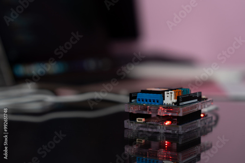 Microcontroller with four relays shield, program and upload to test the operation.