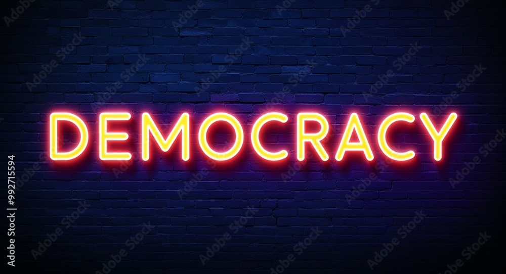Obraz premium democracy word lettering glowing with neon light on dark brick wall background