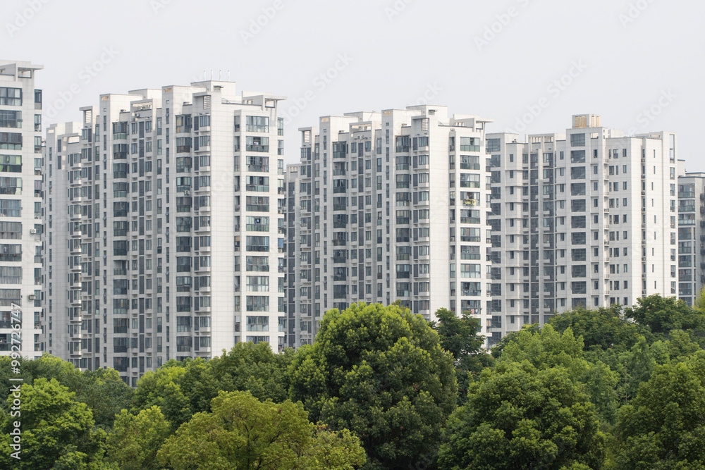 High-rise condo buildings in a residential compound near Hangzhou East Railway Station. The Chinese real estate industry remains in a correction trajectory.
