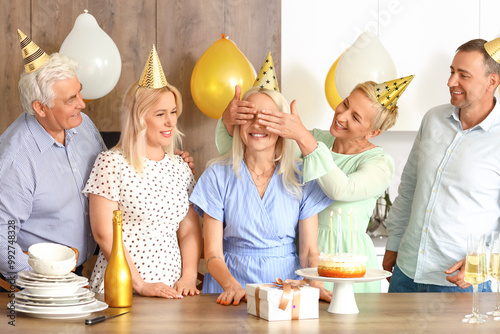 Mature people celebrating B...