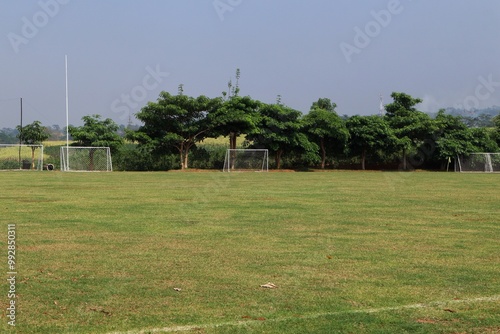 soccer field with balls in natural background in an Indonesian village