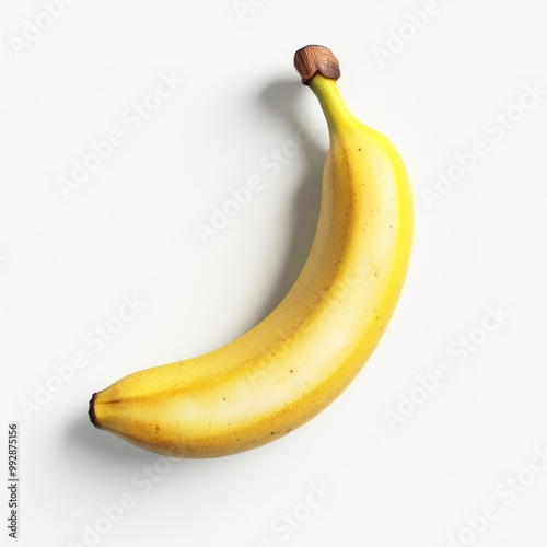 A single ripe yellow banana on a plain white background.