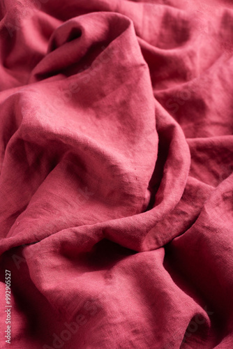 stonewashed linen fabric in dark pink color photo