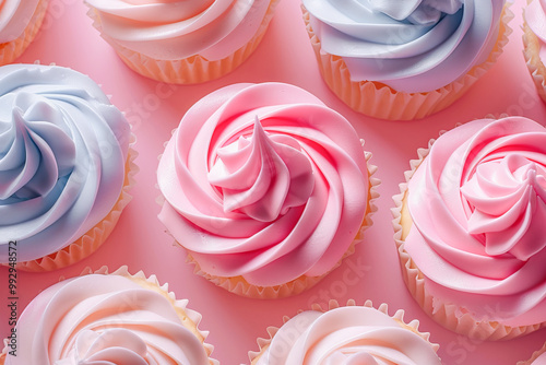 Delicious pink and blue cupcakes creating a tempting display for national pastry day