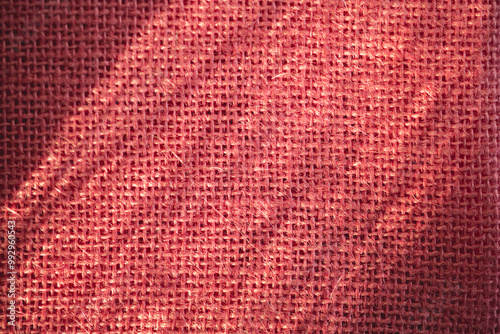 Close up background, bright delicate pink fabric texture, textile texture with floral shadows, perfect for backgrounds, textiles, wallpapers