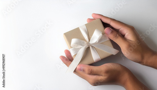 hand with gift box top view isolated on white background