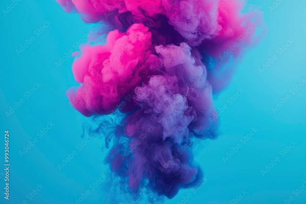 Fototapeta premium Abstract Swirling Pink and Purple Ink in Blue Water