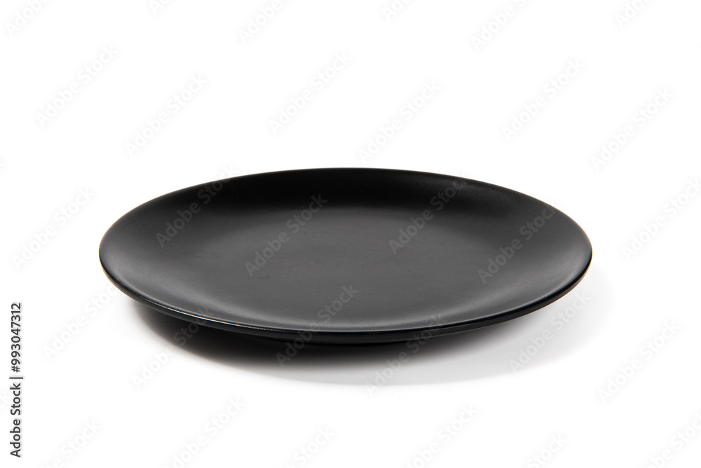 empty black plate isolated on white background empty black plate isolated on white background