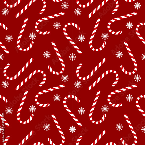 Candy cane with snowflakes seamless pattern on red background 