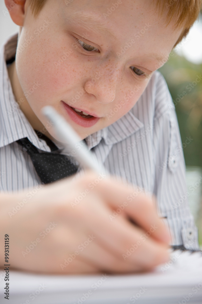 Boy doing homework
Boy doing homework