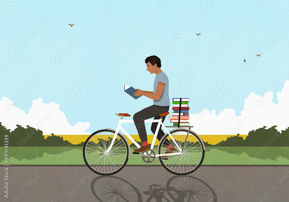 Man with stack of books reading and riding bicycle in sunny, idyllic countryside
Man with stack of books reading and riding bicycle in sunny, idyllic countryside