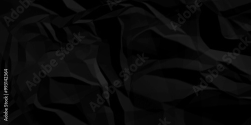 Black crumpled paper texture . Black wrinkled paper texture. Black paper texture . Black crumpled and top view textures can be used for background of text or any contents .