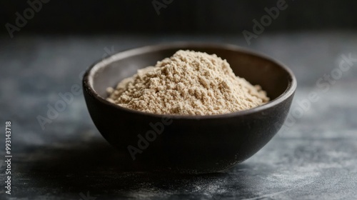 Savory Yeast Powder in a Black Bowl