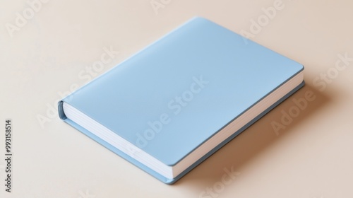 A soft blue notebook lying flat on a smooth surface with a minimalistic background showcasing simple elegance, 3d illustration.