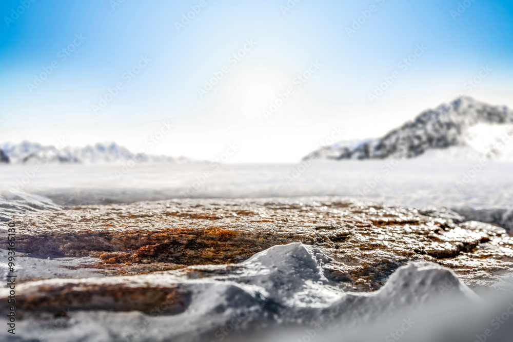 Winter mountain landscape and snow covered ground with copy space for products. Winter mountain landscape and snow covered ground with copy space for products.