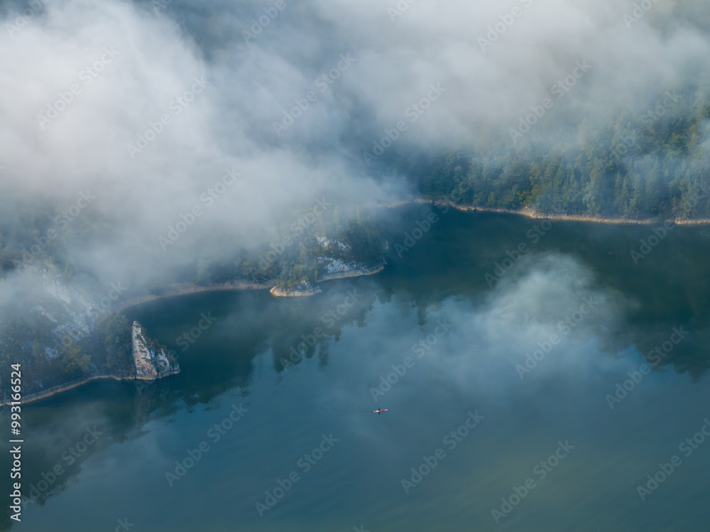 Fototapeta premium Misty Lake with Kayaker Sunrise