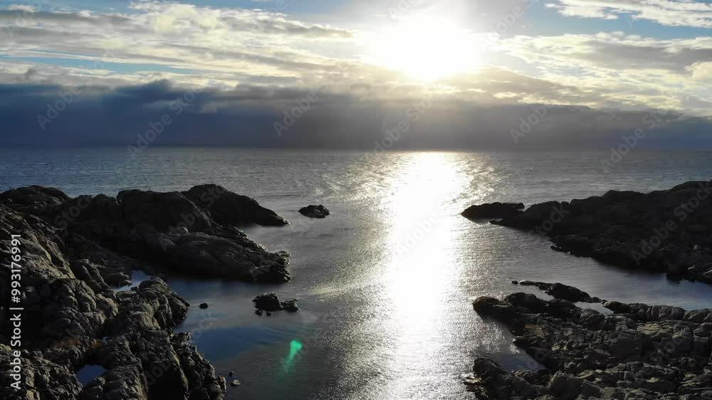 Aerial Drone Shot of Lindesnes and the Sparkling Ocean on a Sunny Day, Vest-Agder, Norway Aerial Drone Shot of Lindesnes and the Sparkling Ocean on a Sunny Day, Vest-Agder, Norway