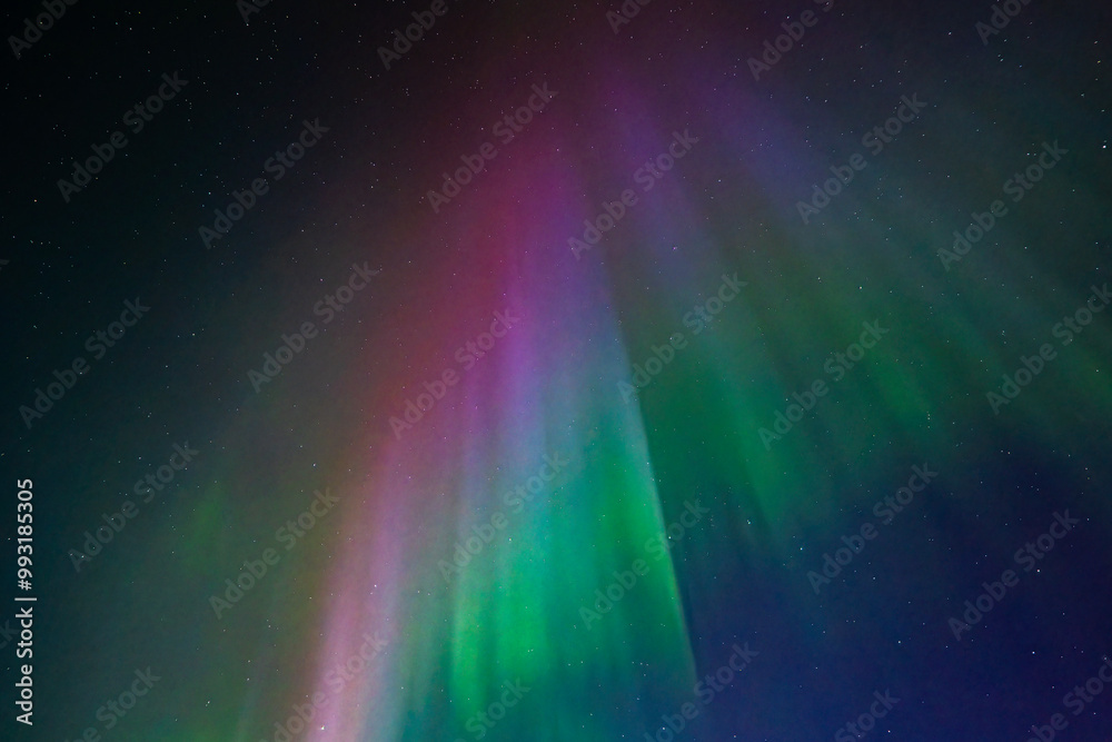 Northern lights dancing over dark specwe in the night. Scenic view of a space area landscape with northern lights in Sweden Northern lights dancing over dark specwe in the night. Scenic view of a space area landscape with northern lights in Sweden