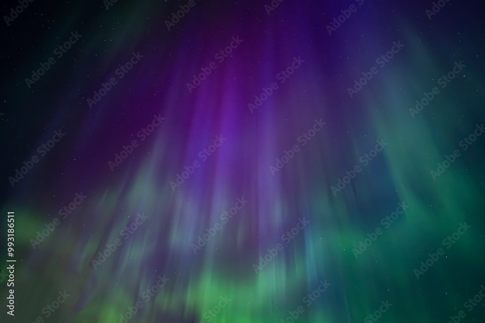 Northern lights dancing over dark specwe in the night. Scenic view of a space area landscape with northern lights in Sweden Northern lights dancing over dark specwe in the night. Scenic view of a space area landscape with northern lights in Sweden