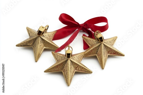 A gold bell, golden stars, and golden ball decoration for a Christmas tree on a white background for the Christmas Festival