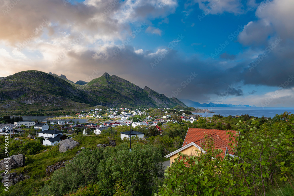 Village image of Sorvagen in middle of lush landscape, with view of Vestfjord in background. Lofoten district in Norway Village image of Sorvagen in middle of lush landscape, with view of Vestfjord in background. Lofoten district in Norway