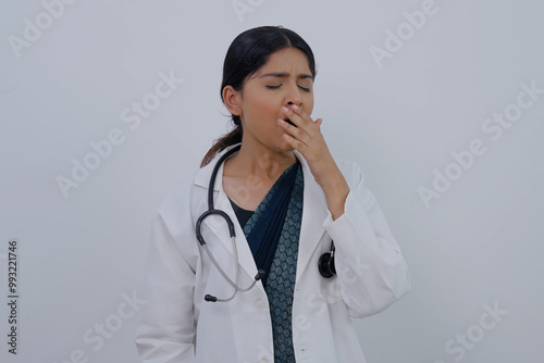 Indian Female Doctor Yawning