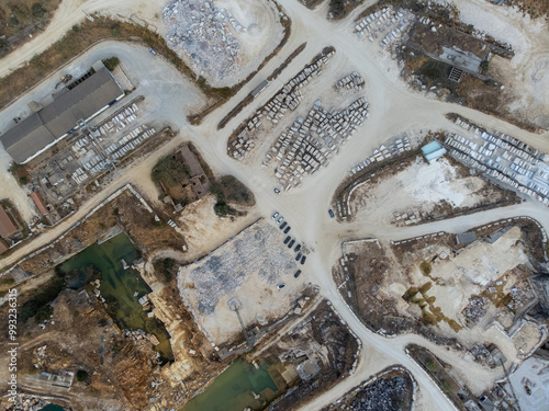 Aerial view of a marble quarry in Vila Viçosa, Alentejo, showcasing expansive stone extraction areas and stunning natural landscapes, ideal for commercial and artistic projects. photo