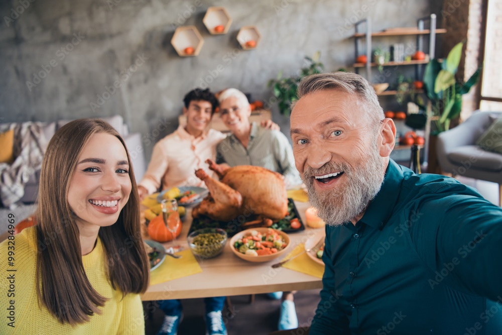 Photo of friendly sweet family eating thanksgiving holiday dinner smiling selfie phtoo camera celebrate indoors house room Photo of friendly sweet family eating thanksgiving holiday dinner smiling selfie phtoo camera celebrate indoors house room