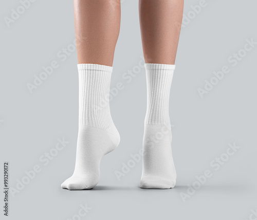 Mockup of white long tiptoe socks front view, high gaiters on women legs isolated on background. photo