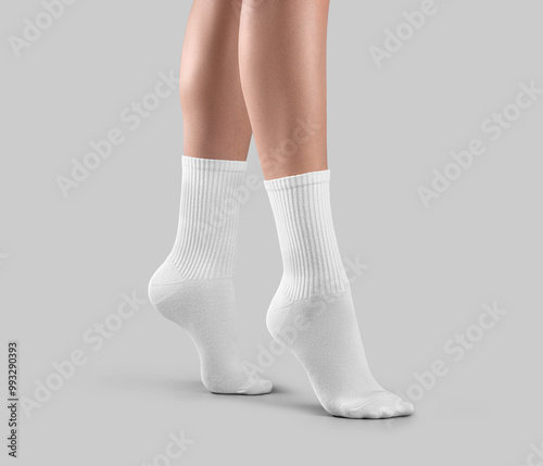 Mockup of white long tiptoe socks side view, high gaiters on women ankles, isolated on background.