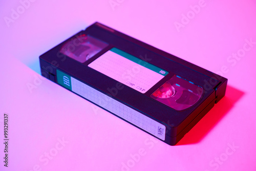 Old video tape cassette on vintage background. Retro and vintage concept