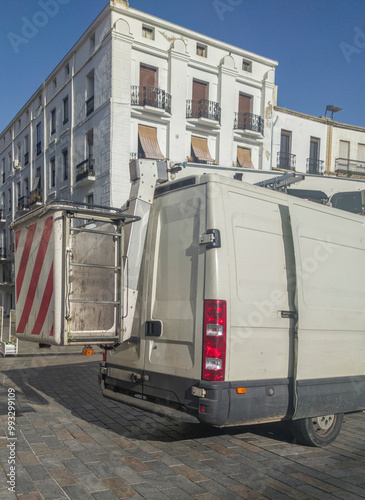 Large commercial van equipped with telescopic boom basket