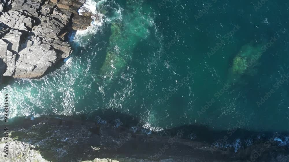 Godrevy Island, Cornwall, England: DRONE VIEWS: The island and Godrevy lighthouse. Godrevy lighthouse first began operating on 1st March 1859 and was built to warn of the nearby Stones Reef (Clip 4).