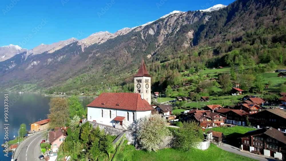 Stunning idyllic nature scenery of lake Brienz with turquoise waters. Switzerland, Bern canton. Aerial view with little church in the morning light
Stunning idyllic nature scenery of lake Brienz with turquoise waters. Switzerland, Bern canton. Aerial view with little church in the morning light