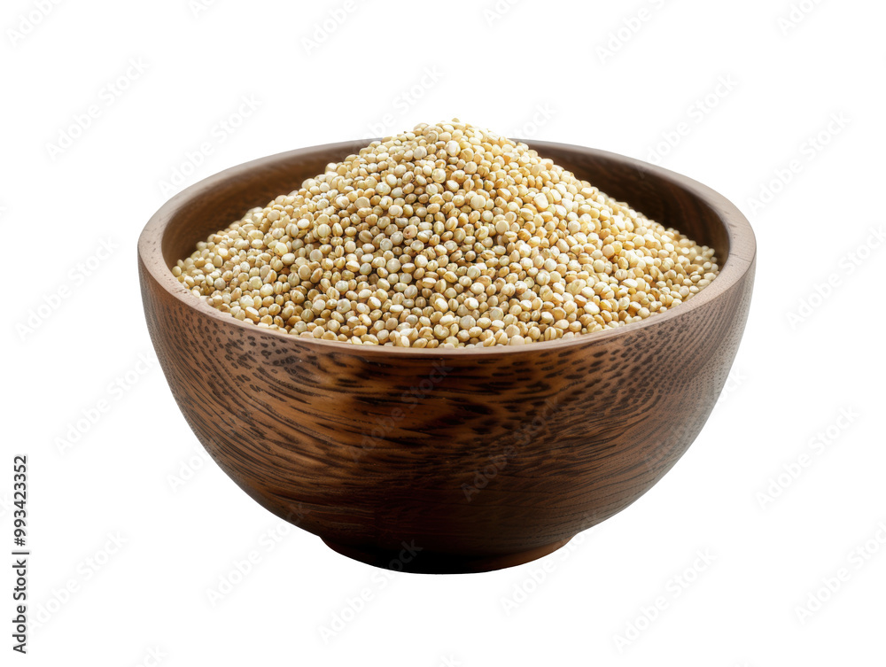 Nutritious grain quinoa in a wooden bowl on a plain background Nutritious grain quinoa in a wooden bowl on a plain background