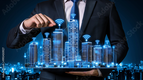 Businessman Holding Smart City Model