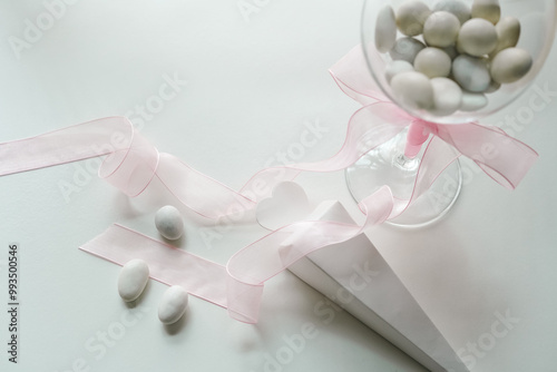 Italian confetti candy (italian sugared almonds) and bomboniere, Concept of a traditional wedding photo