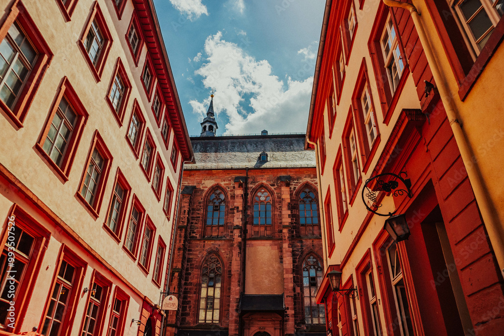 Fototapeta premium Beautiful old architecture in the city of Heidelberg against the blue sky