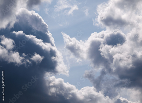 Thick clouds with a blue sky in the background.