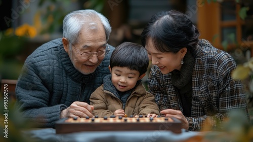 Family Bonding with Traditional Games: Asian Grandparents Teaching Grandchild Cultural Sports