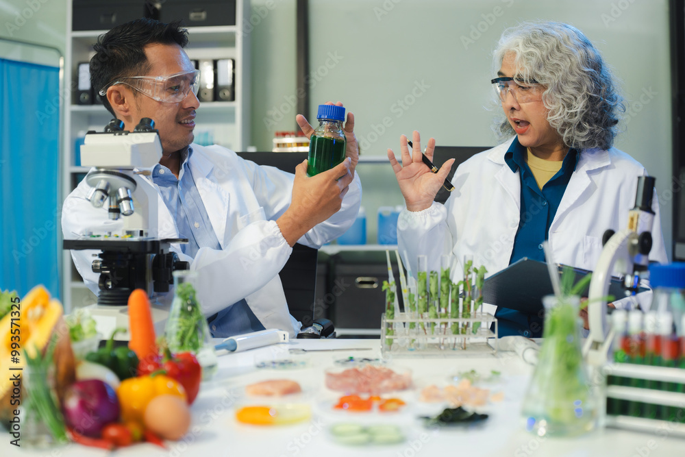 Microbiologist Working on Molecule Samples in Modern Food Science Laboratory, Control experts inspect the concentration of chemical residues. hazards, standard, contaminate. Microbiologist Working on Molecule Samples in Modern Food Science Laboratory, Control experts inspect the concentration of chemical residues. hazards, standard, contaminate.