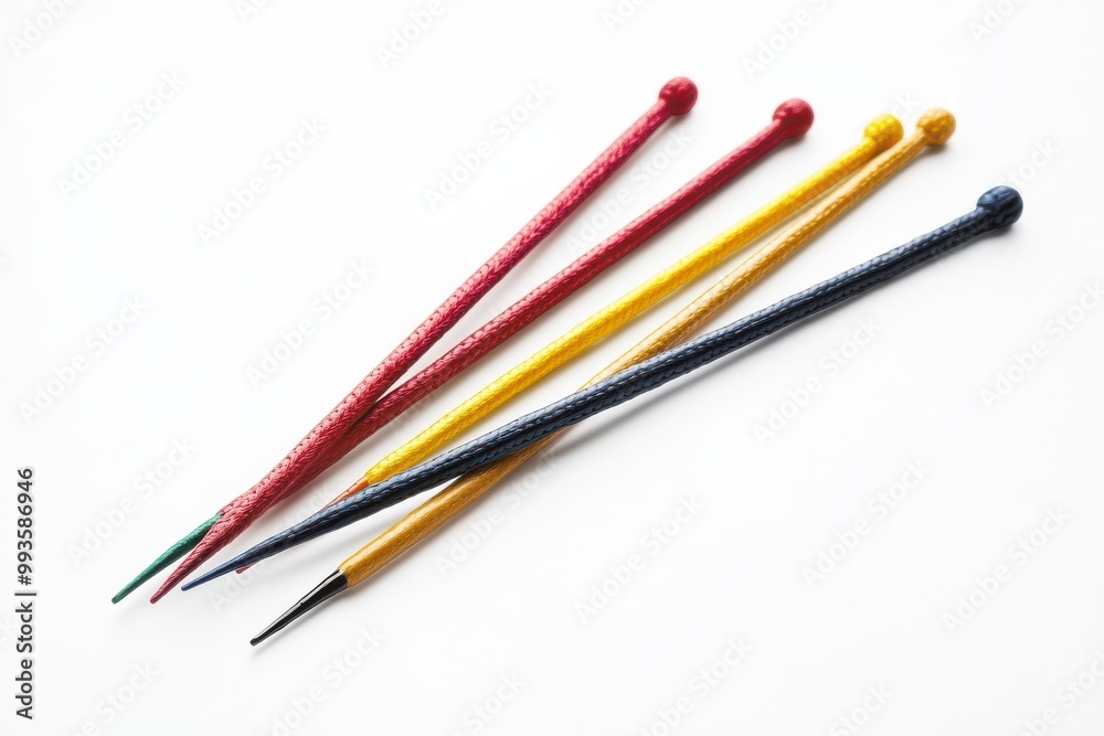 Set of Elegant Knitting Needles for Crafting Cozy Wearables isolated on White Background Set of Elegant Knitting Needles for Crafting Cozy Wearables isolated on White Background