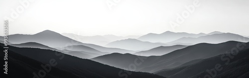 Monochrome mountain silhouette horizon with gradient shades of gray