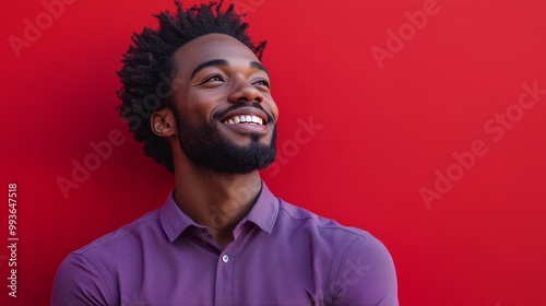 Portrait of a happy handsome man in a shirt with laughing