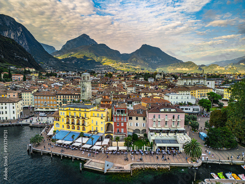 Fototapeta Naklejka Na Ścianę i Meble -  Picturesque town of Riva del Garda by Lake Garda, surrounded by mountains and crystal-clear water.